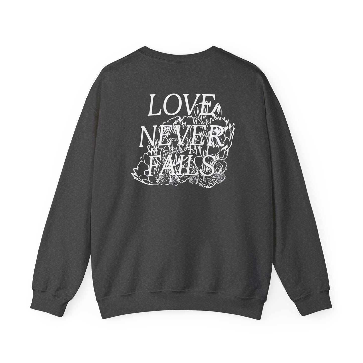 LOVE NEVER FAILS Unisex Heavy Blend™ Crewneck Sweatshirt